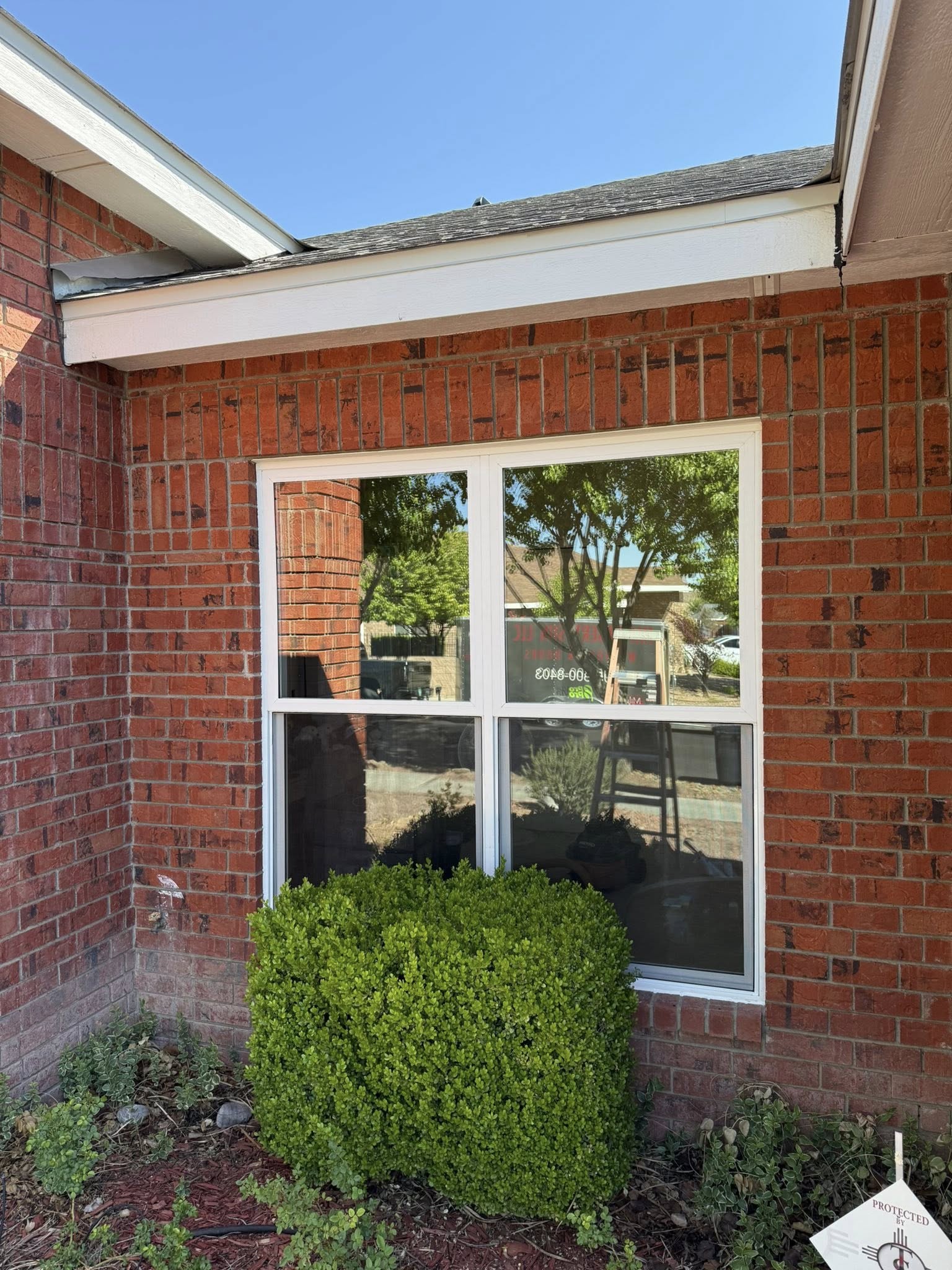 Milgard window on brick home