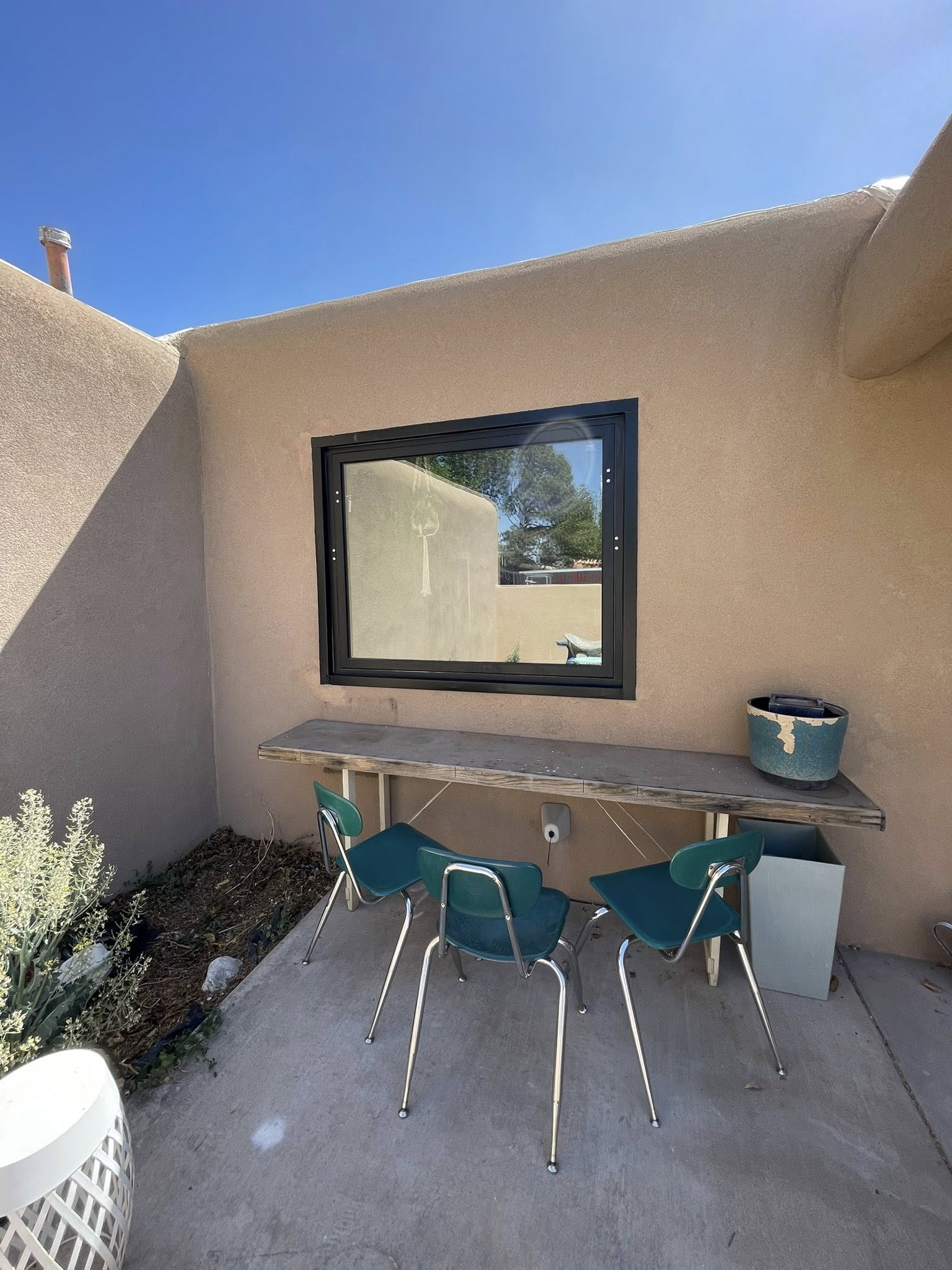Window on stucco home